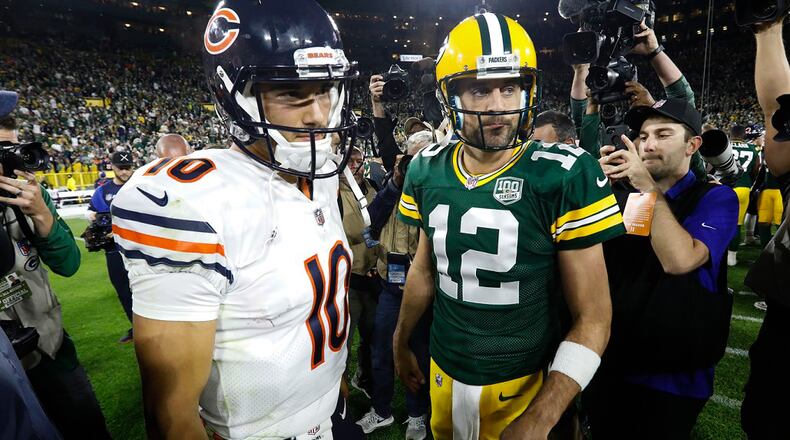 In this Sept. 9, 2018, file photo, Chicago Bears quarterback Mitchell Trubisky, left, talks to Green Bay Packers quarterback Aaron Rodgers after the Packers defeated the Bears 24-23 in an NFL football game in Green Bay, Wis. (AP Photo/Mike Roemer, File)