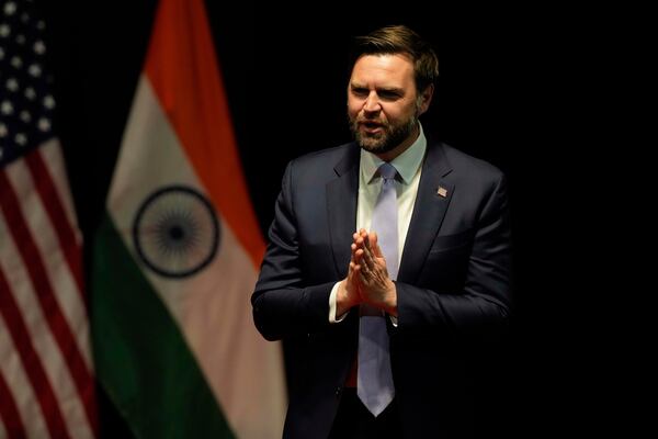 U.S. Vice President JD Vance greets the audience after speaking at the Rajasthan International Center in Jaipur, India, Tuesday, April 22, 2025. (AP Photo/Manish Swarup)