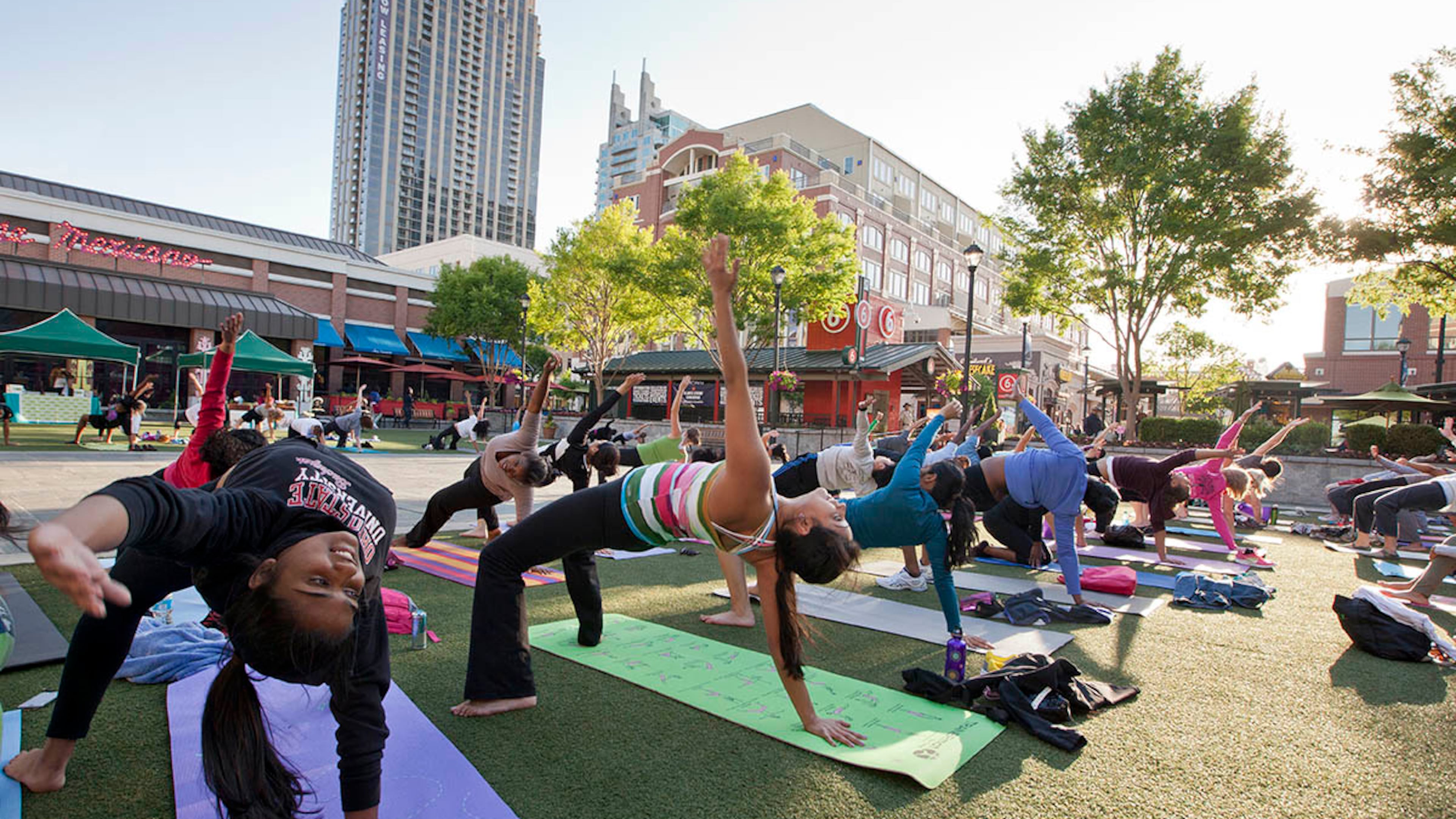 Recharge with free outdoor fitness classes on the Atlantic Green each Wednesday. (AJC File)