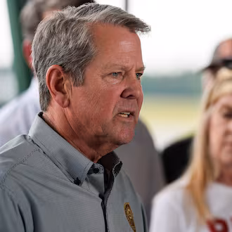 Gov. Brian Kemp speaks on the fires in southeast Georgia, Friday, April 24, 2026, in Waycross, Ga. (Mike Stewart/AP)