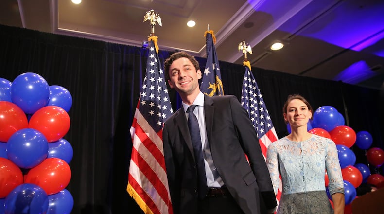 Georgia 6th District congressional candidate Jon Ossoff, with his fiancee Alisha Kramer, leaves the stage during his election night party at the Westin Atlanta Perimeter Hotel Tuesday, June 20, 2017.