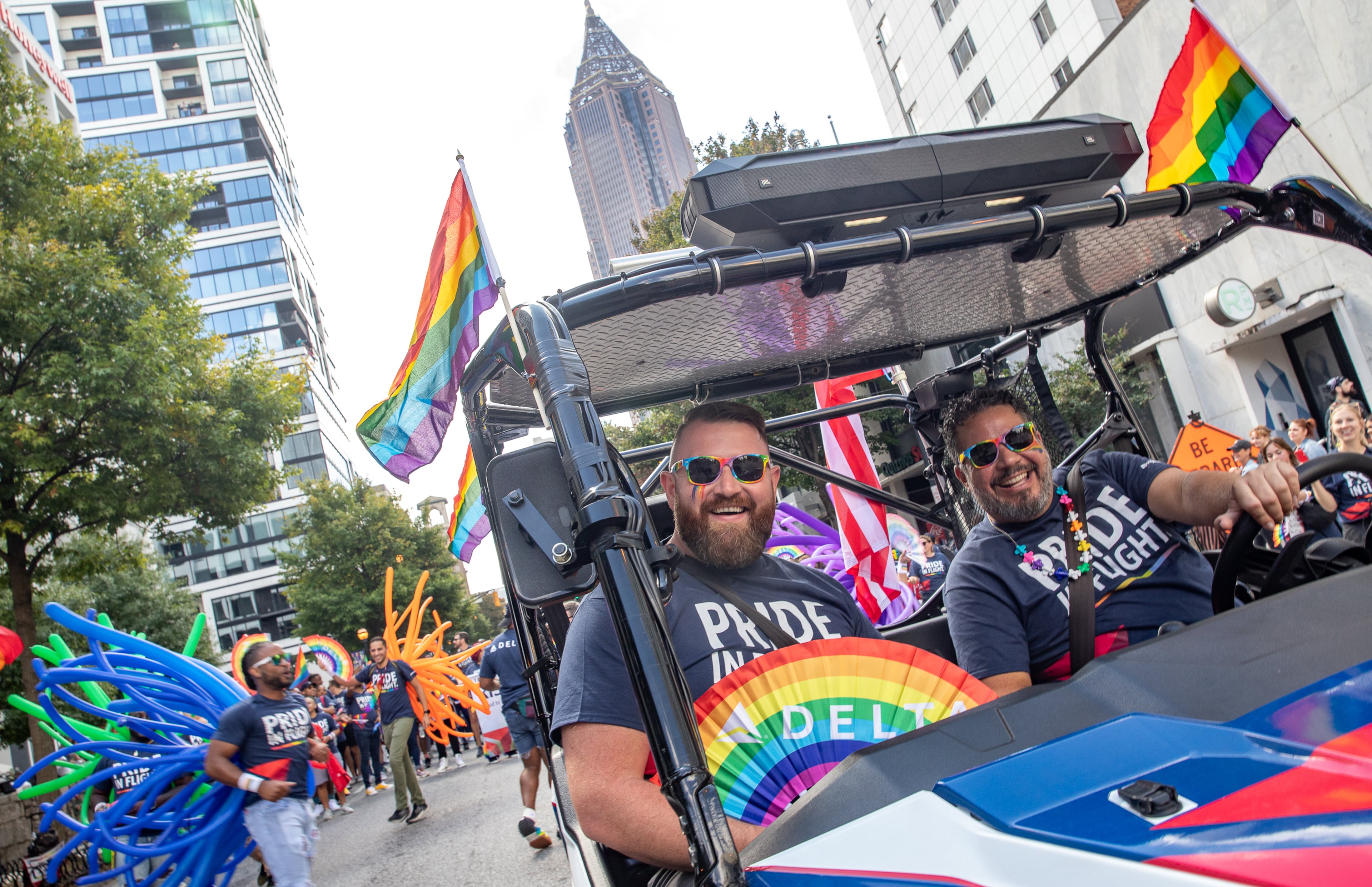 Husbands Price Correa (left) and Carlos Correa lead Delta Air Lines in the Atlanta Pride Parade as it moves down Peachtree Street toward 10th Street before ending in Piedmont Park on Sunday, Oct. 9, 2022. (Photo: Jenni Girtman for The Atlanta Journal-Constitution)