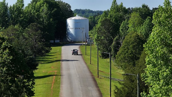 A vehicle approaches to the Stewart Detention Center, a privately run detention center operated by CoreCivic in Lumpkin, Georgia. 
(Miguel Martinez/ AJC)