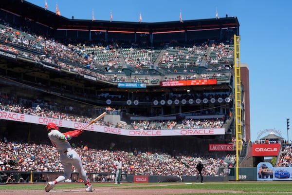 Philadelphia Phillies' Bryce Harper hits a home run against the San Francisco Giants during the fourth inning of a baseball game in San Francisco, Wednesday, July 9, 2025. (AP Photo/Jeff Chiu)