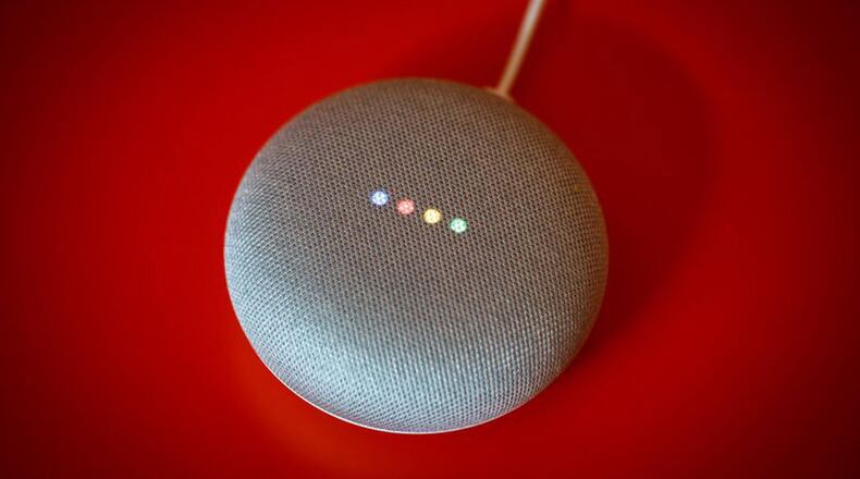 The Google Home Mini stands tall as one of the best affordable smart speakers out there, along with the Amazon Echo Dot, but it doesn’t do enough to supplant the Dot at the top of the list. (Josh Miller/CNET/TNS)