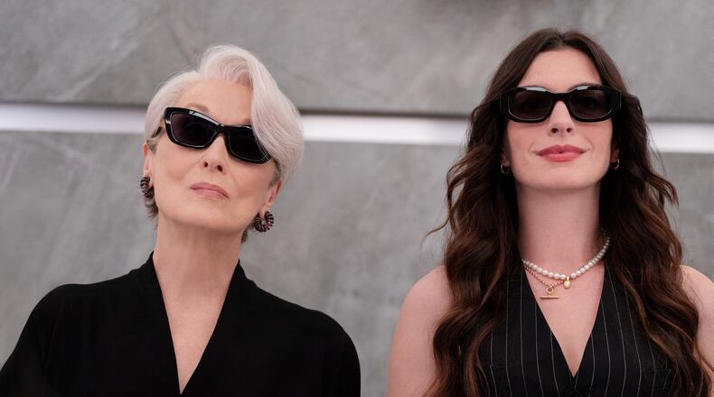 This image released by 20th Century Studios shows Meryl Streep, left, and Anne Hathaway in a scene from "The Devil Wears Prada 2." (Macall Polay/20th Century Studios via AP)