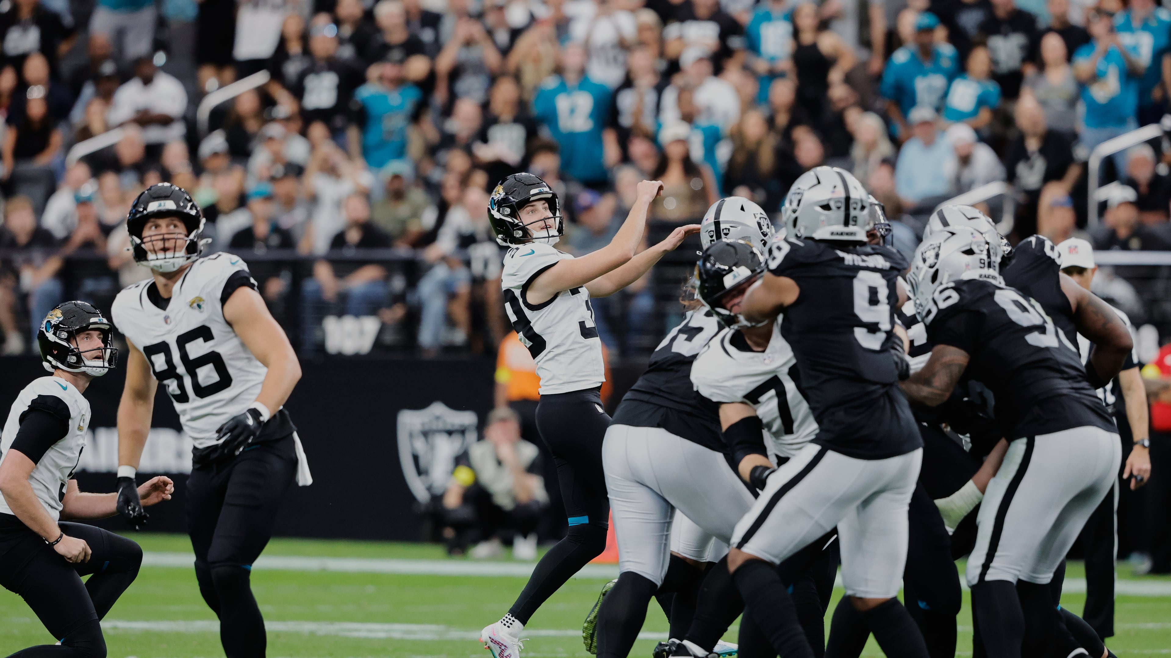 Jacksonville Jaguars place kicker Cam Little (39) watches his 68-yard field goal during the first half of an NFL football game against the Las Vegas Raiders, Sunday, Nov. 2, 2025, in Las Vegas. (AP Photo/Steve Marcus)