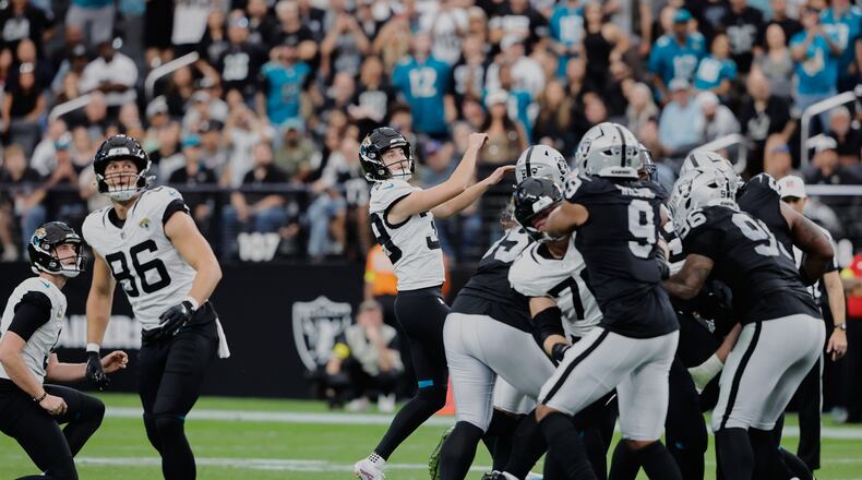 Jacksonville Jaguars place kicker Cam Little (39) watches his 68-yard field goal during the first half of an NFL football game against the Las Vegas Raiders, Sunday, Nov. 2, 2025, in Las Vegas. (AP Photo/Steve Marcus)
