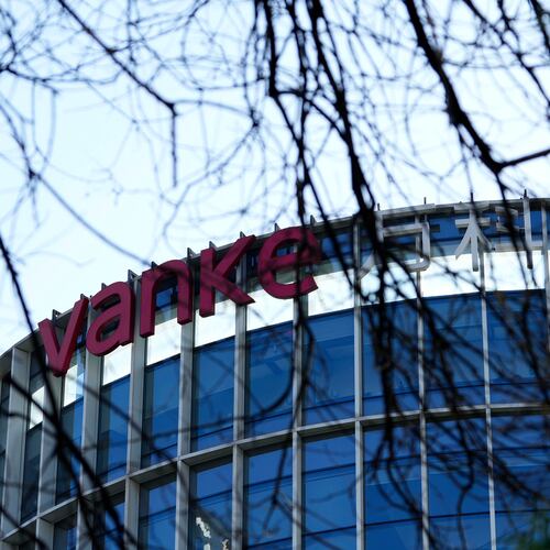 The Vanke logo is seen on a commercial complex in Beijing, China, Wednesday, Dec. 24, 2025. (AP Photo/Ng Han Guan)