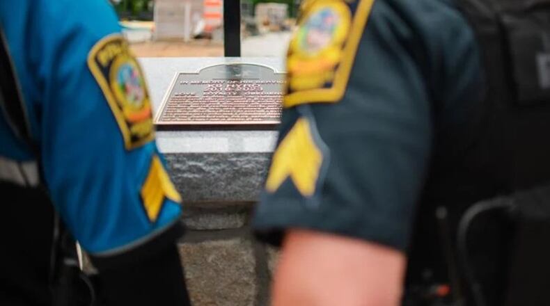 A plaque memorializes Lawrenceville Police K-9 Hyro at the city's new dog park, which is named in his honor. Hyro Park is set to open in early August. (Courtesy of City of Lawrenceville)