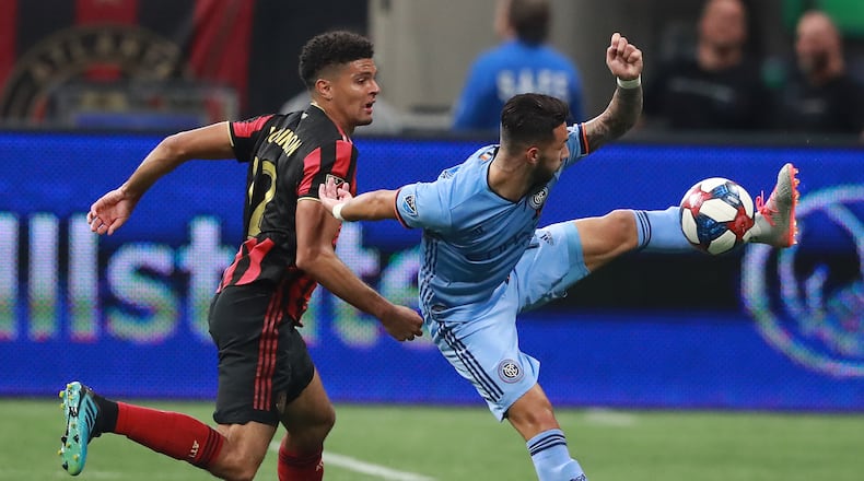 August 11, 2019 Atlanta: Atlanta United defender Miles Robinson defends against New York City FC forward Valentin Castellanos in their soccer match on Sunday, August 11, 2019, in Atlanta. Curtis Compton/ccompton@ajc.com