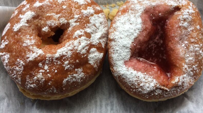 Caramel and strawberry doughnuts are a wonderful thing to have with coffee at Rozina Bakehouse & Coffee. CONTRIBUTED BY WENDELL BROCK