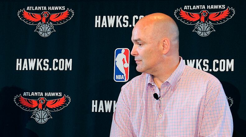 FILE - In this May 29, 2013, file photo, Atlanta Hawks general managerr Danny Ferry waits during a news conference in Atlanta. Ferry has taken an indefinite leave of absence after making racially charged comments about a potential free agent. (AP Photo/David Tulis, File) Danny Ferry is taking an indefinite leave from the Hawks. (AP)