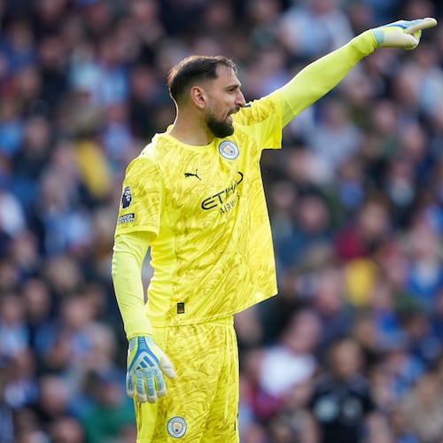Manchester City's goalkeeper Gianluigi Donnarumma gestures during the English Premier League soccer match between Manchester City and and Arsenal, in Manchester, England, Sunday, April 19, 2026. (AP Photo/Dave Thompson)