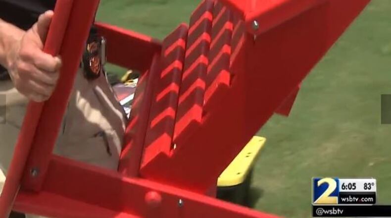 GBI agents remove items from the home of GBI Inspector Sandra Putnam in 2016. (Channel 2 Action News)