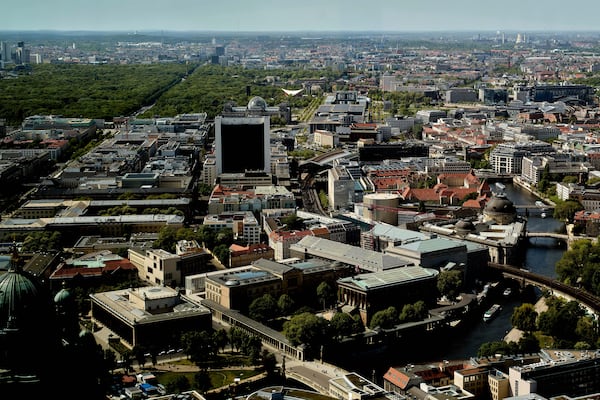 A aeriel view of the area around the Reichstag Building with the glass dome, at center top, of Berlin, Germany, Tuesday, April 29, 2025. (AP Photo/Markus Schreiber)