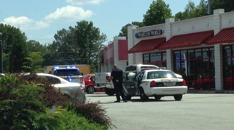 Dunwoody police officers are assisting authorities from Gwinnett County and the FBI as they search for suspects who fled from police near Ashford Dunwoody Road and I-285. Doug Rohan (@RohanLawPC) sent the AJC photos of the scene via Twitter on July 29, 2014.