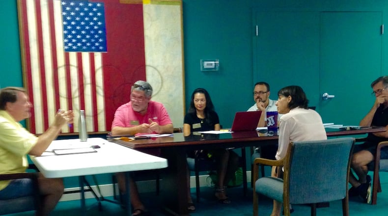 Avondale Estates’ commission left to right, Mayor Pro Tem Terry Giager (yellow shirt), Randy Beebe, Adela Yelton, Brian Fisher and Mayor Jonathan Elmore interview a Planning and Zoning Board candidate Monday.