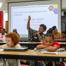 Concerned South Fulton parents, including Shaunda Freeman, center, ask questions of the school district’s staff at Tri-Cities High School on Wednesday, Nov 6, 2024 about a proposal to close Parklane Elementary School in East Point. The Fulton County school board voted Thursday to 5-2 to advance a plan to close Parklane. (Jenni Girtman for The Atlanta Journal-Constitution)