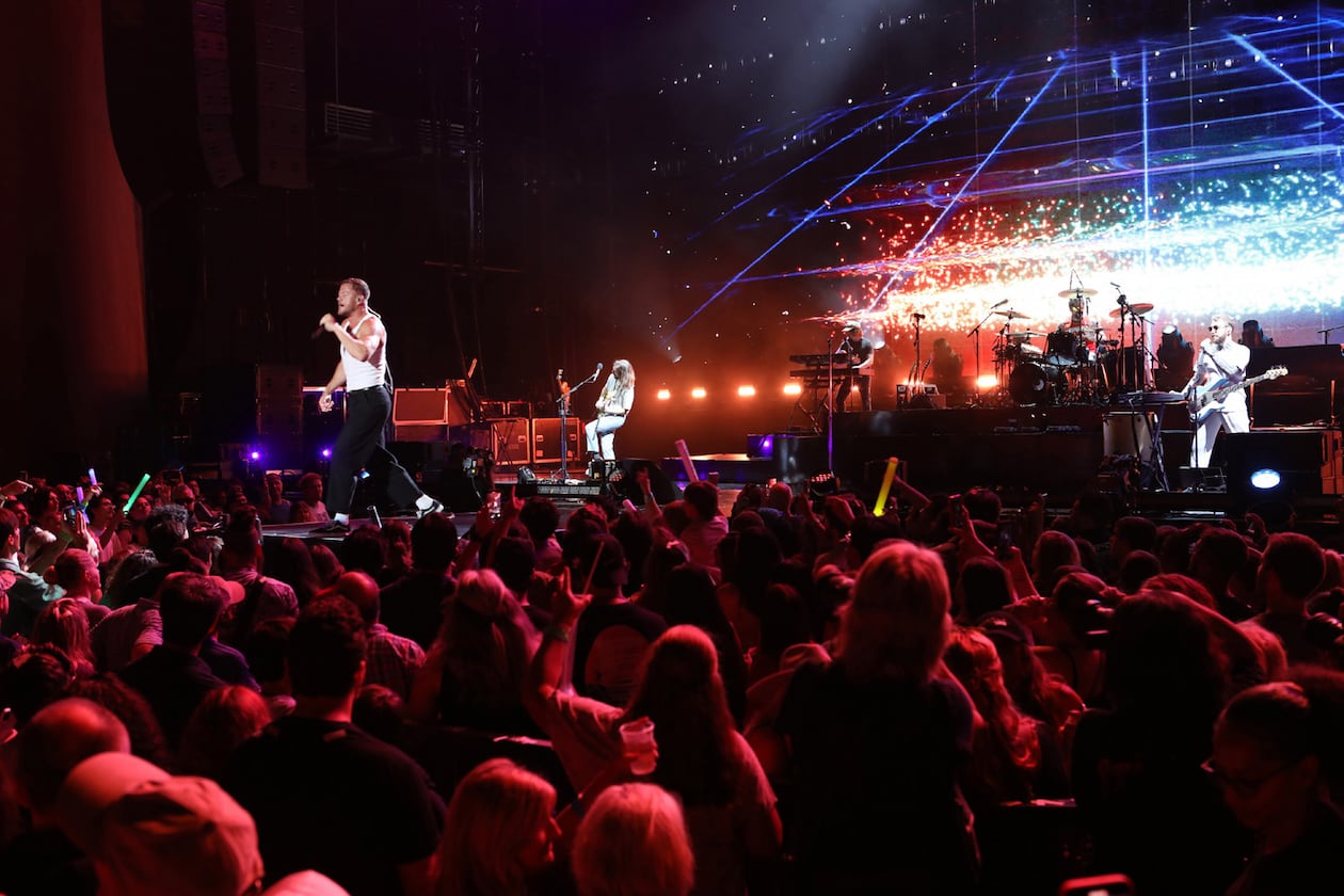 A crowd watches as Imagine Dragons performs on their Mercury Tour in 2022 at Lakewood Amphitheatre. The venue maintains a long-term lease with Live Nation. (Robb Cohen for the AJC 2022)