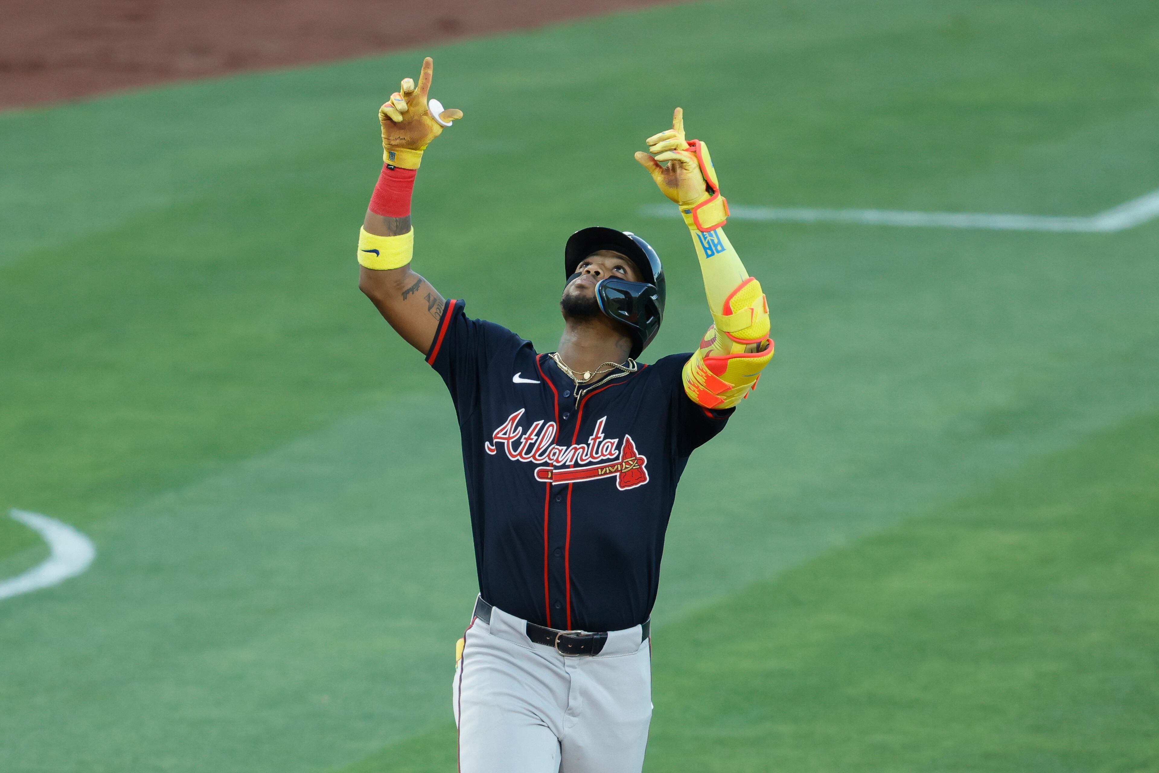 Atlanta Braves' Ronald Acuña Jr. points to the sky after hitting his second home run of the game in the fourth inning of a baseball game against the Athletics, Wednesday, July 9, 2025, in West Sacramento, Calif. (AP Photo/Sergio Estrada)