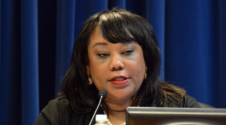 DeKalb County Commissioner Sharon Barnes Sutton speaks during a meeting at Dekalb County Government Administration Building in Decatur on Tuesday, Aug. 26, 2014. HYOSUB SHIN / HSHIN@AJC.COM