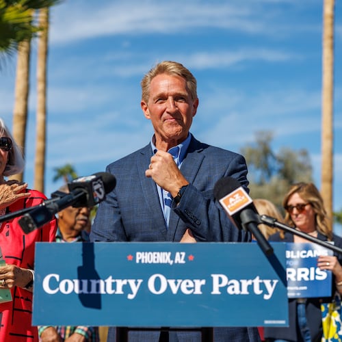 Former Republican Senator and Ambassador Jeff Flake speaks in support of Kamala Harris outside the Indian Bend Wash Visitor Center on October 30, 2024 in Scottsdale, Arizona. Now, Flake has endorsed Democrat U.S Sen. Jon Ossoff against his Republican opponent U.S. Rep. Mike Collins, saying that character matters more than partisan differences. (Gina Ferazzi/Los Angeles Times via Getty Images 2024)