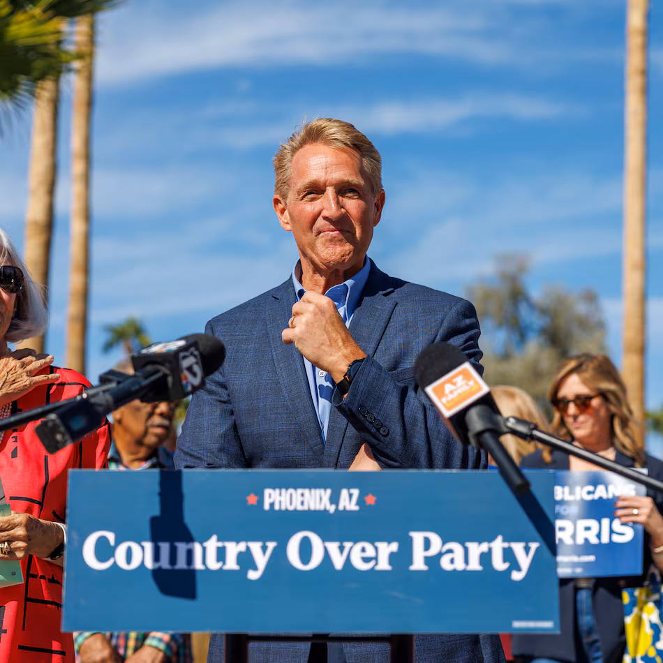 Former Republican Senator and Ambassador Jeff Flake speaks in support of Kamala Harris outside the Indian Bend Wash Visitor Center on October 30, 2024 in Scottsdale, Arizona. Now, Flake has endorsed Democrat U.S Sen. Jon Ossoff against his Republican opponent U.S. Rep. Mike Collins, saying that character matters more than partisan differences. (Gina Ferazzi/Los Angeles Times via Getty Images 2024)