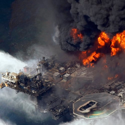 FILE - The Deepwater Horizon oil rig burns on April 21, 2010, in the Gulf of Mexico, more than 50 miles southeast of Venice, La. (AP Photo/Gerald Herbert, File)