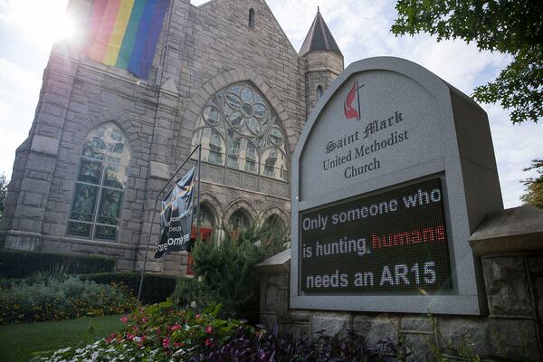 The St. Marks United Methodist Church sign displays a message regarding the recent mass shootings in El Paso and Dayton outside of its campus in Atlanta's Midtown community, Tuesday, August 6, 2019.  