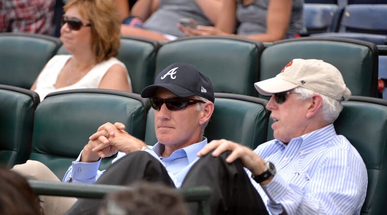 April 21, 2016 Atlanta - Liberty Media CEO Greg Maffei (left) and Atlanta Braves Chairman and CEO Terry McGuirk talk during Atlanta Braves game against the Los Angeles Dodgers at Turner Field on Thursday, April 21, 2016. HYOSUB SHIN / HSHIN@AJC.COM