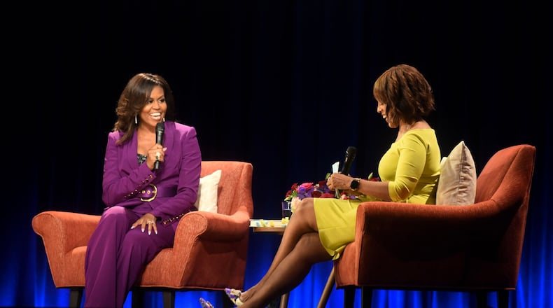 Former first lady Michelle Obama (left) and “CBS This Morning” co-host Gayle King, who served as moderator, took the stage on Saturday night, May 11, 2019, at State Farm Arena in Atlanta to discuss Obama's memoir, “Becoming.” (Photo: RYON HORNE / AJC)