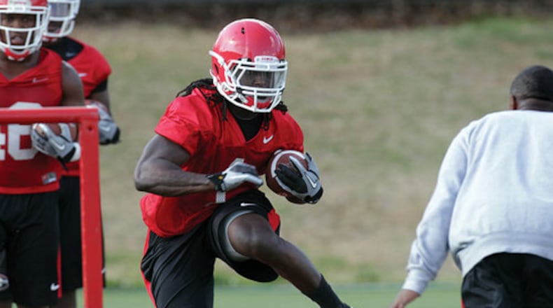 032012 ATHENS : UGA tailback Isaiah Crowell runs through a foot drill on the opening day of spring football practice in Athens, Tuesday, March 20, 2012. Curtis Compton ccompton@ajc.com UGA tailback Isaiah Crowell runs through a foot drill on the opening day of spring football practice in Athens. Curtis Compton ccompton@ajc.com
