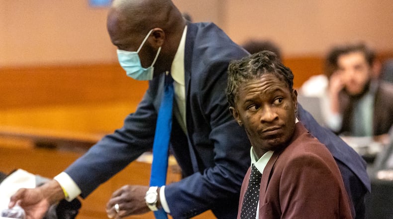 Rapper Young Thug, whose real name is Jeffery Williams, waits for the jury selection portion of the trial to continue in a Fulton County courtroom on Tuesday, Jan. 24, 2023 in Atlanta, Georgia. (Steve Schaefer/steve.schaefer@ajc.com)