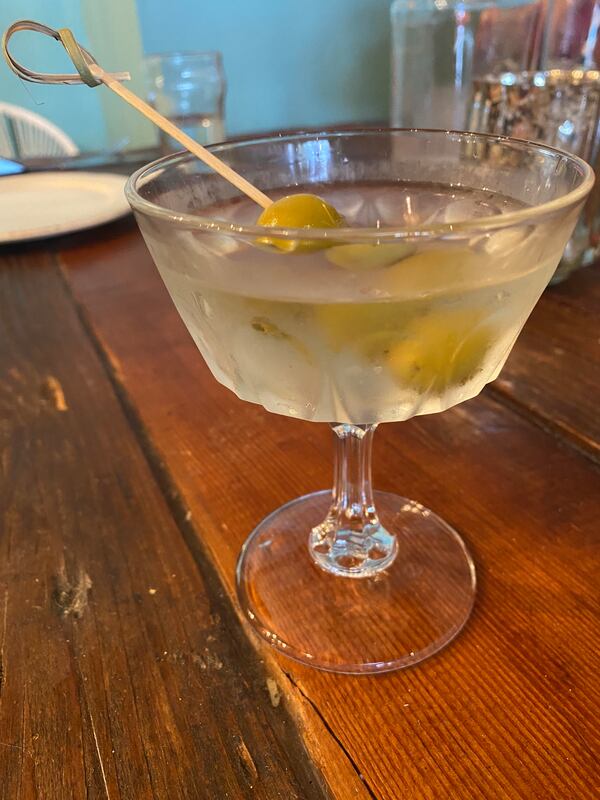 The Sucio at Boho115 is a dirty martini made with anchovy brine, instead of olive juice. Ligaya Figueras/ligaya.figueras@ajc.com