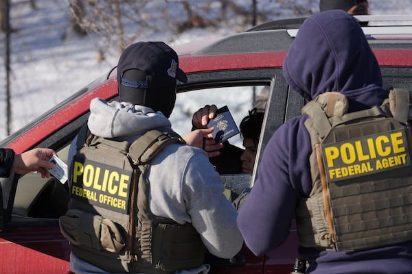 Federal agents made a traffic stop on a U.S. citizen in Minneapolis, Minn., on Tuesday. (Adam Gray/AP)