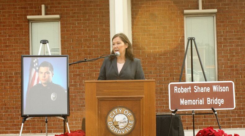 Doraville Mayor Donna Pittman unveils memorial plaque honoring the memory of Doraville police officer Detective Shane Wilson. (Credit: City of Doraville)