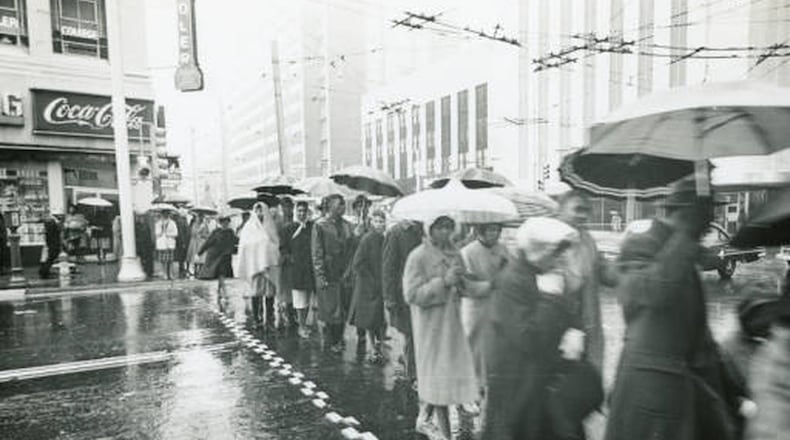 Students seen protesting against segregated lunch counters in downtown Atlanta in December 1960. The demonstrations eventually led to a law banning the practice in public establishments.