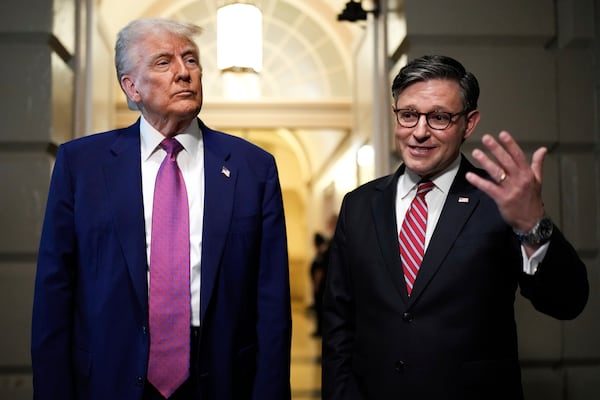 President Donald Trump and Speaker of the House Mike Johnson, R-La., speak to reporters after departing a House Republican conference meeting, Tuesday, May 20, 2025, at the U.S. Capitol in Washington. (AP Photo/Julia Demaree Nikhinson)