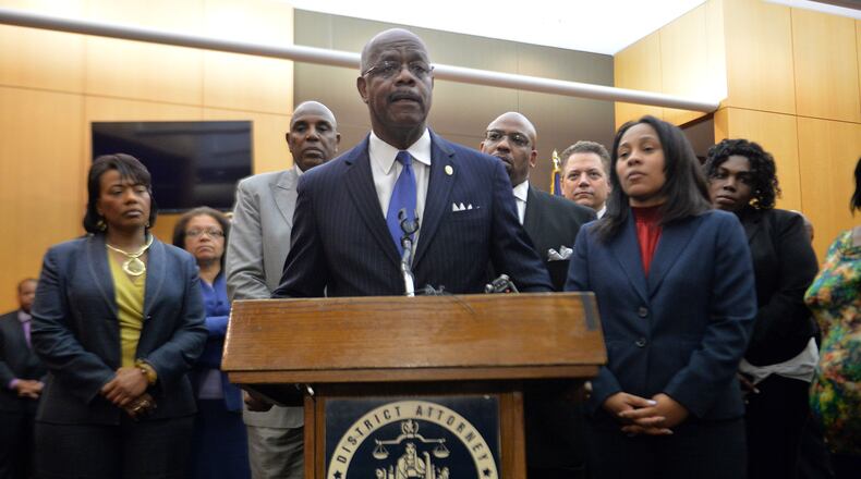 Fulton County District Attorney Paul Howard speaks during a press conference in the courtroom following the sentencing. Sentencing continues for 10 of the 11 defendants convicted of racketeering and other charges in the Atlanta Public Schools test-cheating trial before Judge Jerry Baxter in Fulton County Superior Court, Tuesday, April 14, 2015. (Atlanta Journal-Constitution, Kent D. Johnson, Pool)
