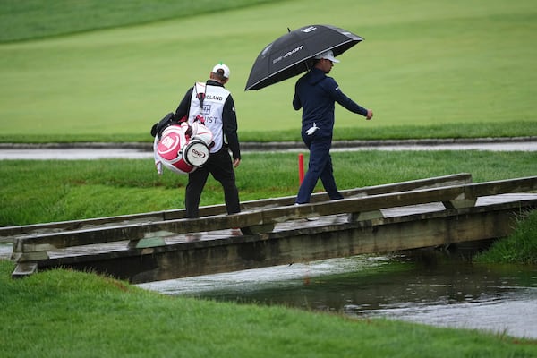 Gary Woodland walks on the 13th hole during the second round of the Truist Championship golf tournament at the Philadelphia Cricket Club, Friday, May 9, 2025, in Flourtown. (AP Photo/Matt Rourke)