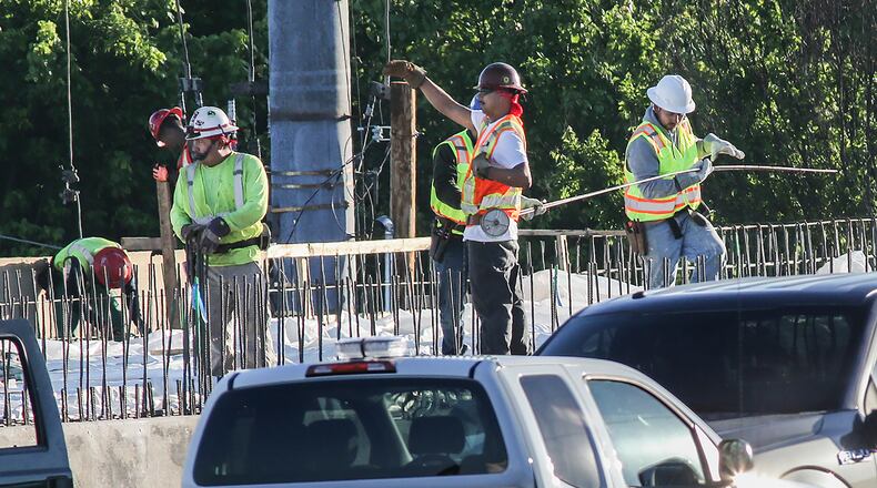 Construction crews on Monday, May 8, 2017, getting the median wall between southbound and northbound I-85 ready for concrete. Contractor C.W. Matthews is rebuilding 350 feet of northbound and 350 feet of southbound lanes on I-85. JOHN SPINK/JSPINK@AJC.COM