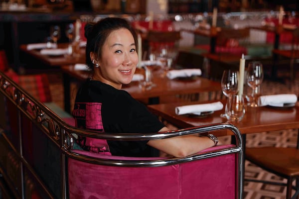 Niki Pattharakositkul owner of Pink Lotus inside the restaurant on Thursday, July 3, 2025. (Natrice Miller/AJC)