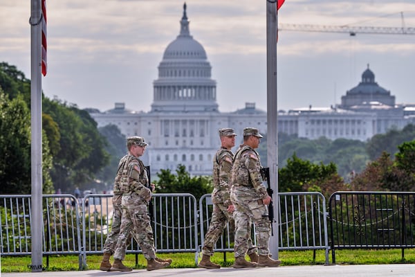 National Guard troops patrol the grounds of the Washington Monument as part of President Donald Trump's order to impose federal law enforcement in the nation's capital, in Washington, Thursday, Aug. 28, 2025. (J. Scott Applewhite/AP)