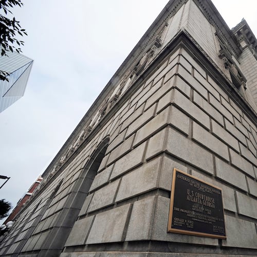 FILE - The exterior of the U.S. Courthouse for the 11th U.S. Circuit Court of Appeals stands in Atlanta, July 21, 2019. (AP Photo/Mike Stewart, File)