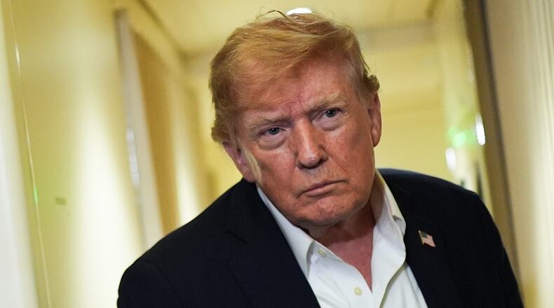 President Donald Trump speaks with reporters while in flight on Air Force One from Shannon, Ireland to Joint Base Andrews, Md., Sunday, Sept. 13, 2026. (AP Photo/Julia Demaree Nikhinson)