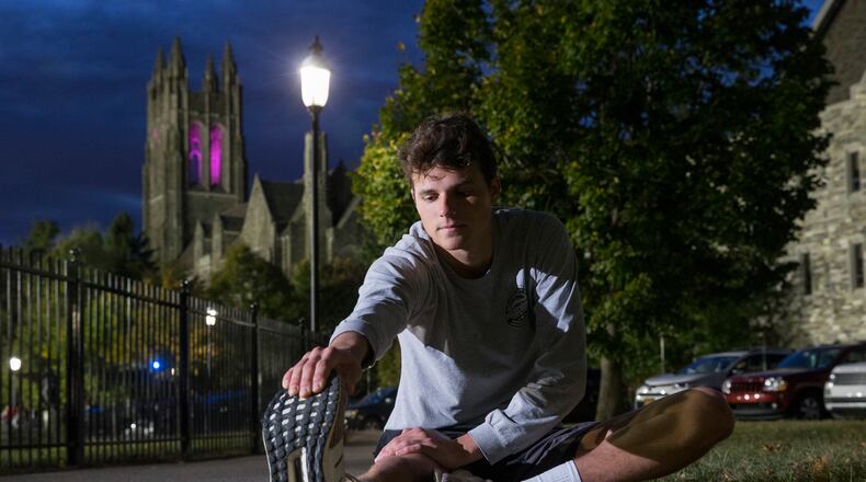 Ethan Widrig is running a 5K every single day for 100 days to raise money for Alzheimer’s awareness and research. He usually runs at night. Charles Fox/The Philadelphia Inquirer/TNS