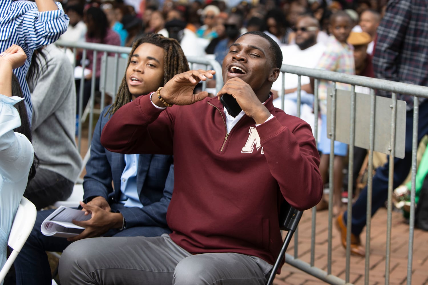 Quentin Noaks cheers during the Morehouse College commencement ceremony on Sunday, May 21, 2023, on Century Campus in Atlanta. The graduation marked Morehouse College's 139th commencement program. CHRISTINA MATACOTTA FOR THE ATLANTA JOURNAL-CONSTITUTION