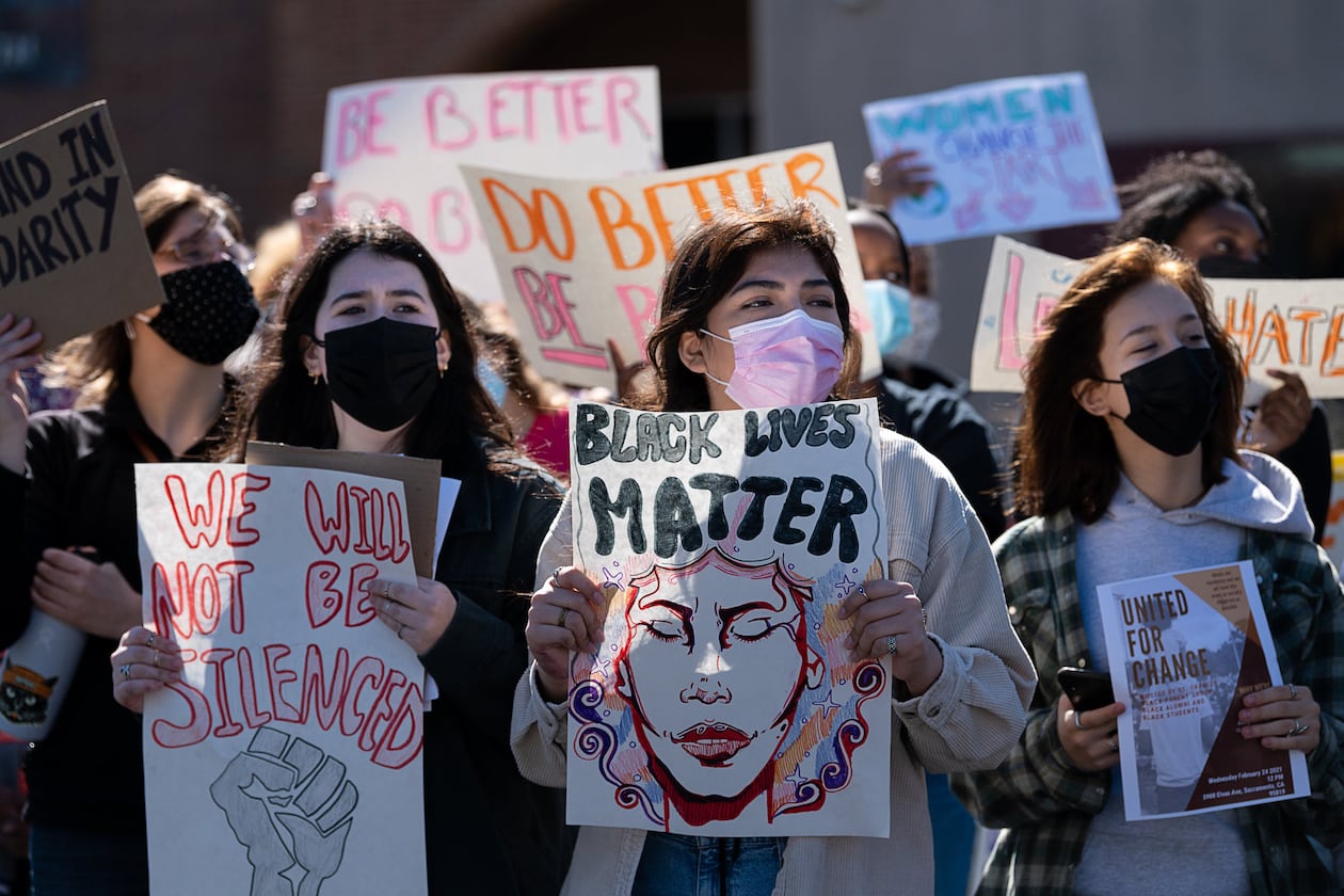 St. Francis High School students show support for Black students during a United for Change rally Wednesday, Feb. 24, 2021, after a student was disciplined for allegedly using a Snapchat feature to imitate Blackface and mock a Black peer. (Paul Kitagaki Jr./The Sacramento Bee)