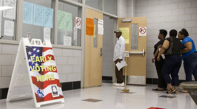 People wait in line for Saturday early voting at the C.T. Martin Natatorium and Recreation Center in Atlanta, Georgia, on Saturday, May 12, 2018. (REANN HUBER/REANN.HUBER@AJC.COM)